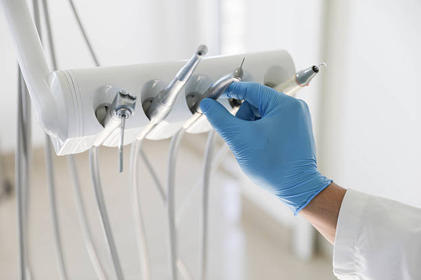 Professional Tooth Extraction technician working in Rockingham County County, NC